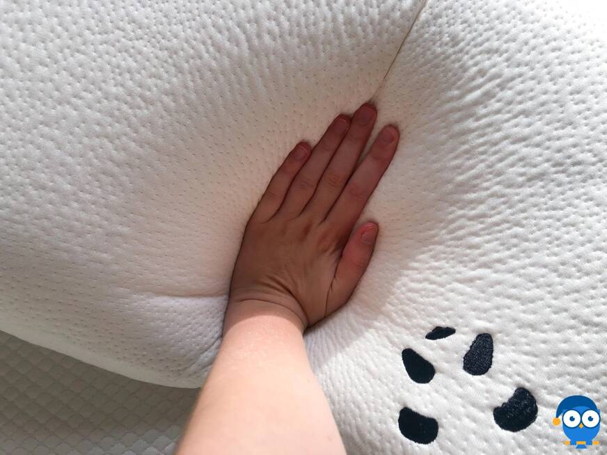 Pressing hand on Panda Kids pillow